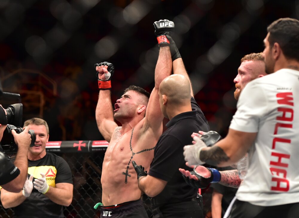 Jun 3, 2017; Rio de Janeiro, RJ, Brazil; Luan "Tarzan" Chagas ?(red gloves) vs. Jim "Judo" Wallhead? (blue gloves)?????? during UFC 212 at Jeunesse Arena. Mandatory Credit: Jason Silva-USA TODAY Sports